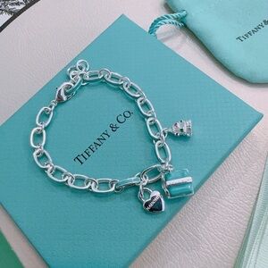 Tiffany & Co. Silver Charm Bracelet with Turquoise Accents